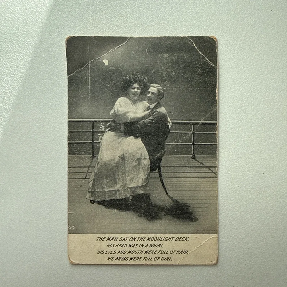1912 Romance Postcard-Man Holding a Lady on His Lap on a Moonlight Ship's Deck